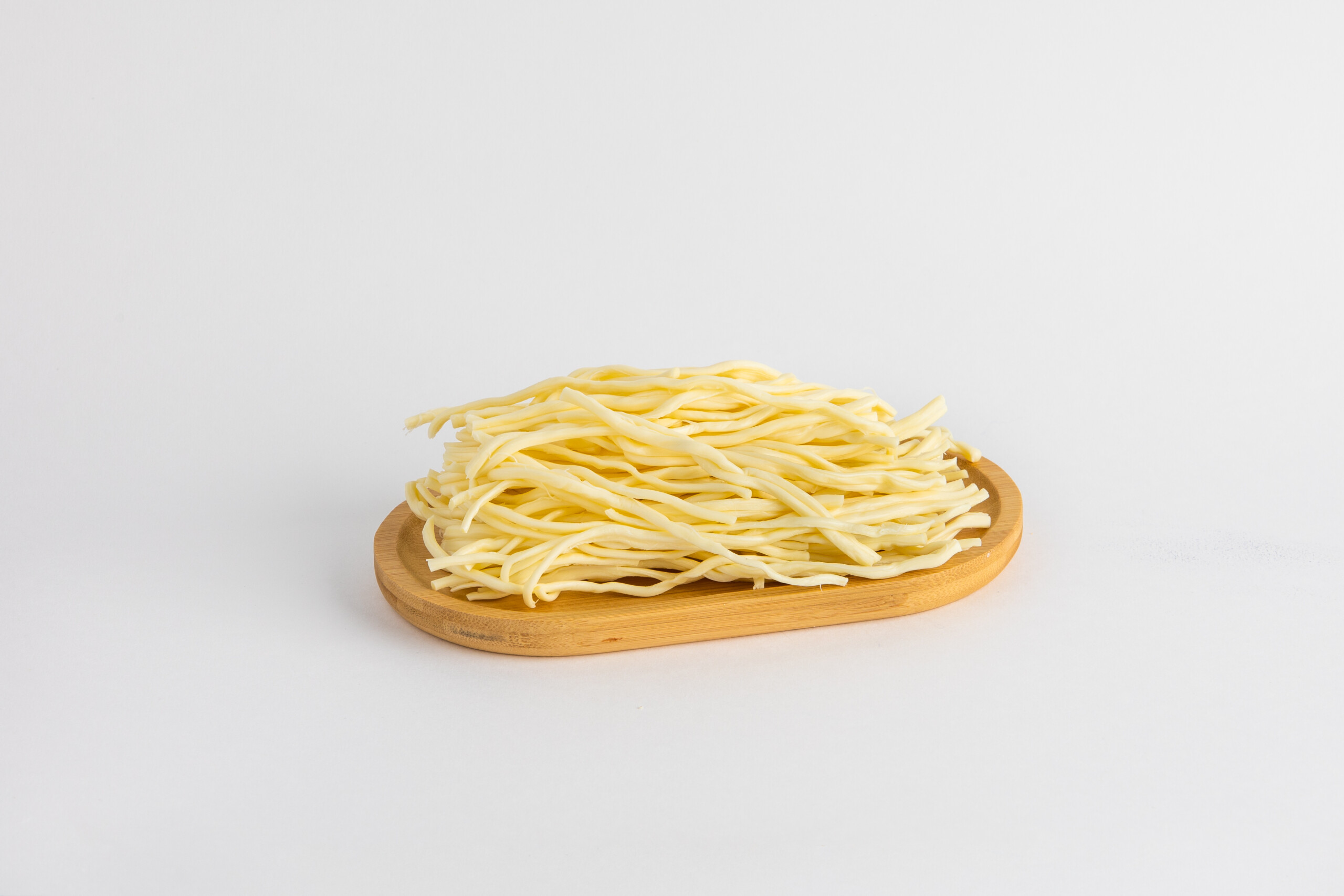 Сырный молоко макароны. Сыр спагетти. Сыр спагетти молочный. Сыр Чечил. Сыр спагетти белый.